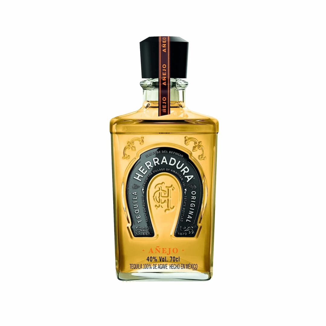 Herradura Añejo : Barrel-aged for an industry surpassing 25 months for a brilliant flavor of slow-roasted agave, aged wood, toasted almond, and spices.